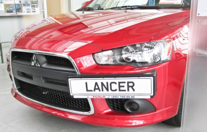 Рамка под номер на передний бампер (текстурный пластик) для Mitsubishi Lancer X (2010-2016) купить недорого с доставкой в Абакан