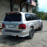 Накладки на задний бампер (сток) Toyota Land Cruiser 100 купить недорого с доставкой в Абакан