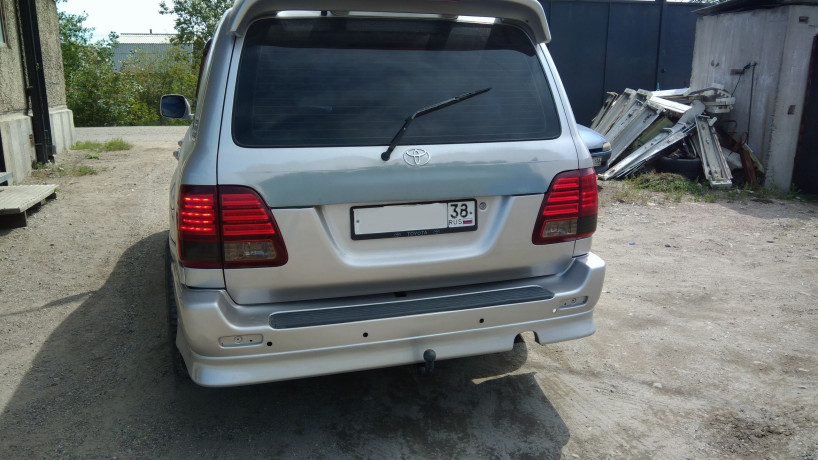 Накладки на задний бампер (сток) Toyota Land Cruiser 100 купить недорого с доставкой в Абакан